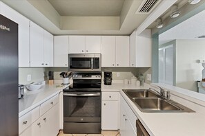 Condo, Multiple Beds, Balcony, Ocean View (ANC-PH8) | Private kitchen | Fridge, microwave, oven, stovetop