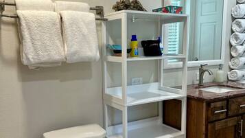 Hair dryer, towels, soap, shampoo