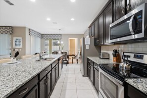 House, Multiple Beds, Pool Access (CVT1712) | Private kitchen - 1712 Caribbean View Terrace (Kissimmee)