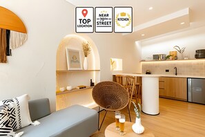 Apartamento | Área de estar | Smart TV 65 cm com canais digitais, pisos aquecidos