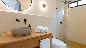 Apartment | Bathroom | Shower, rainfall showerhead, hair dryer, soap