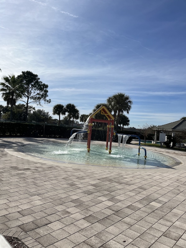 A water feature with a small pavilion in a park. - Gated Community Close to Disney and attractions! No Pet Fee! (Clermont)