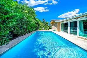 Outdoor pool, a heated pool - Paradise Villa ~Beach, Billiards & NEW POOL~ 4.98/5 stars on ABNB 60 reviews
 (Deerfield Beach)