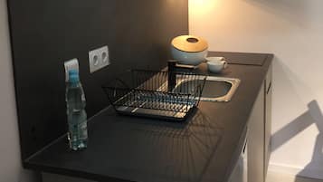 Kylskåp, mikrovågsugn, spishäll och diskmaskin