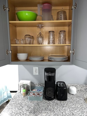 Fridge, microwave, stovetop, coffee/tea maker