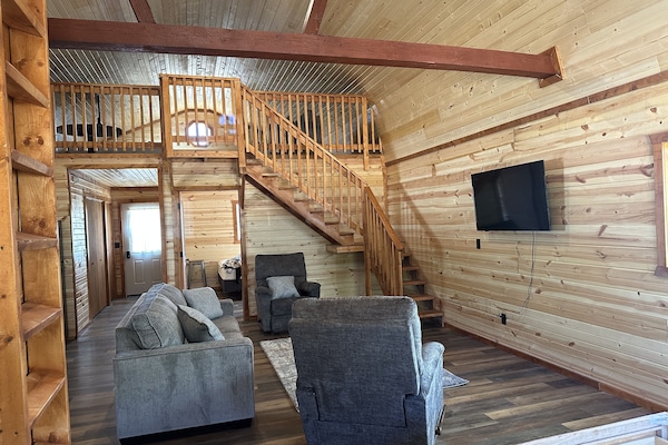 View of the living area and the upstairs loft
