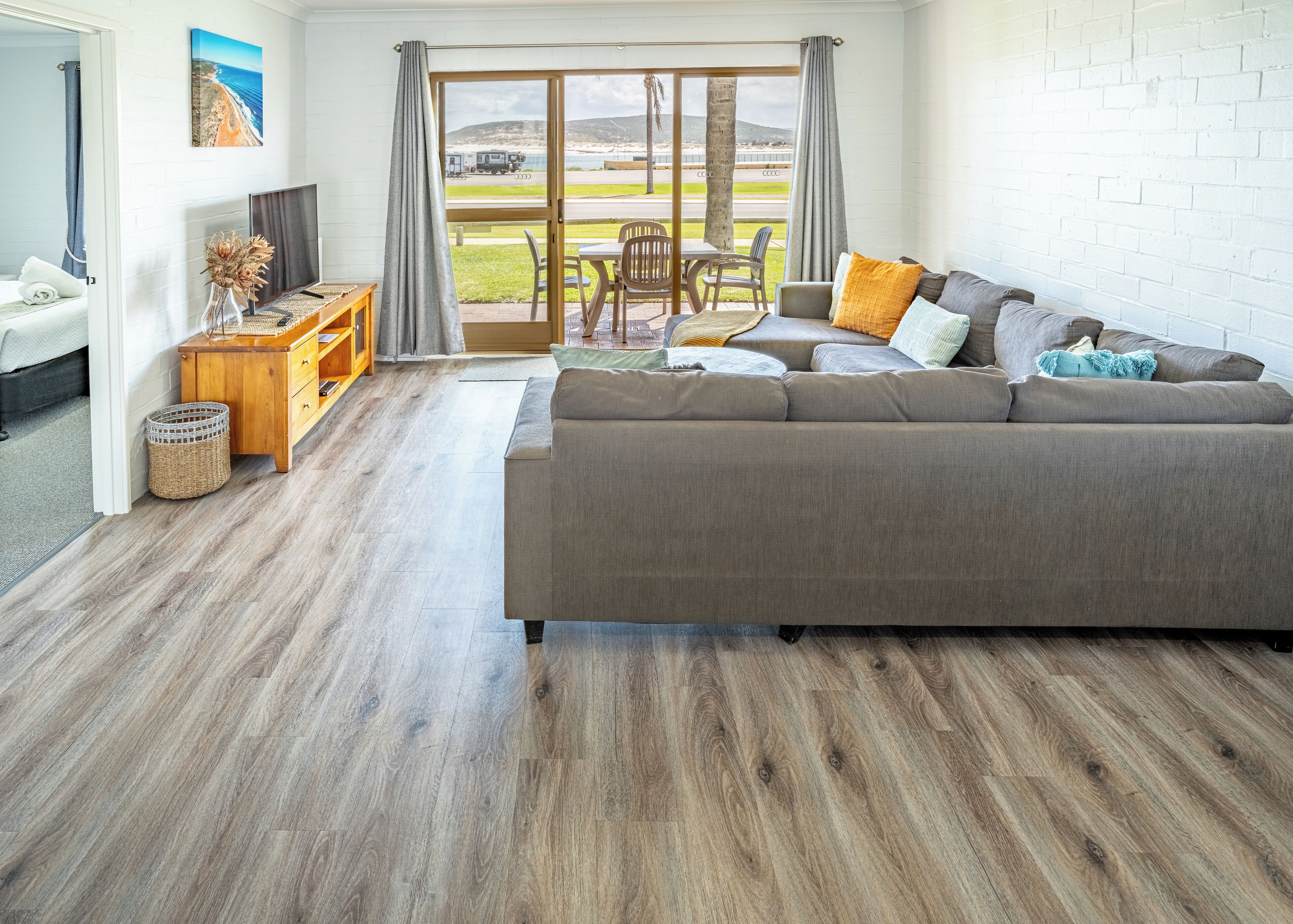 Panoramic Apartment, Beach View | Living area | 60-inch Smart TV with digital channels, streaming services