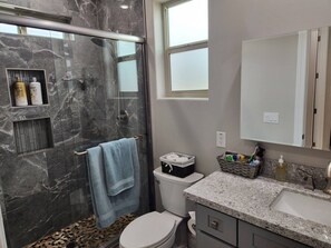 Shower, hair dryer, towels, soap