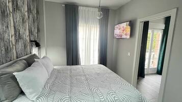 3 dormitorios, tabla de planchar con plancha, wifi gratis y ropa de cama