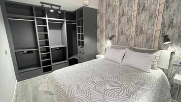 3 dormitorios, tabla de planchar con plancha, wifi gratis y ropa de cama