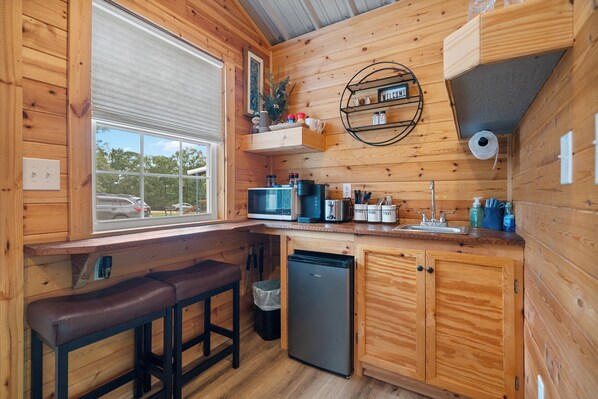 Fridge, microwave, coffee/tea maker, toaster