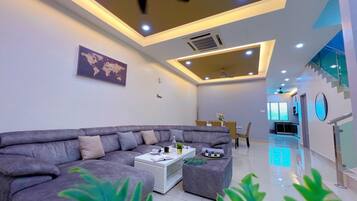 55-inch Smart TV with cable channels, video game console, toys