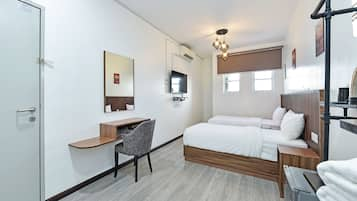 Deluxe Twin Room | Seterika/papan seterika, cadar katil 