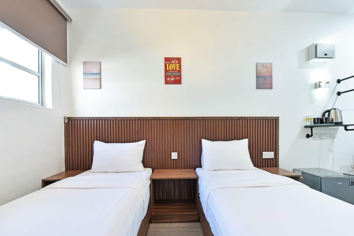 Deluxe Twin kamer | 1 slaapkamer, een strijkplank/strijkijzer, beddengoed