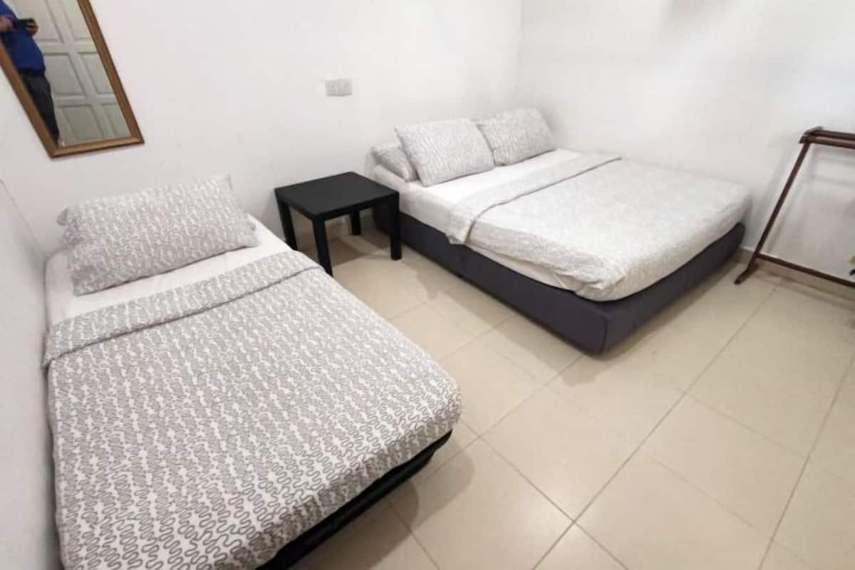 1 habitación y ropa de cama