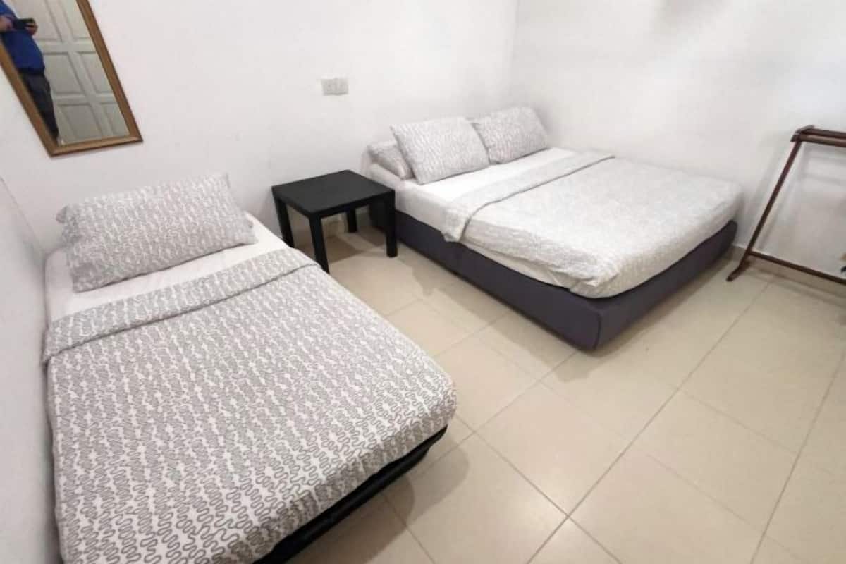 1 habitación y ropa de cama
