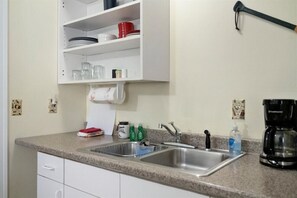 Fridge, microwave, coffee/tea maker, toaster