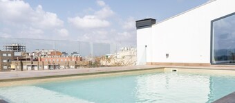 Design flat for 2 people with communal swimming pool and gym.