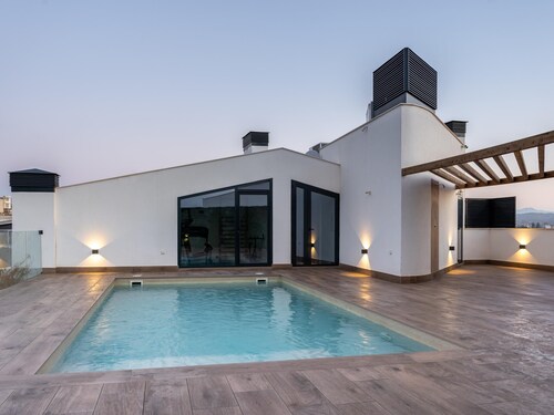 Design flat for 2 people with communal swimming pool and gym.