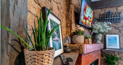 Studio with charmic electric fireplace for a romantic getaway