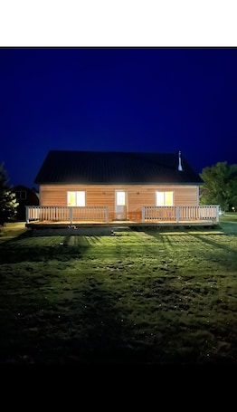 Exterior. Little cabin near a lake
