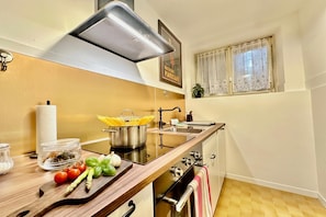 Family Apartment, Multiple Bedrooms, Lakeside (Casa Matilde 1) | Private kitchen | Fridge, oven, stovetop, dishwasher