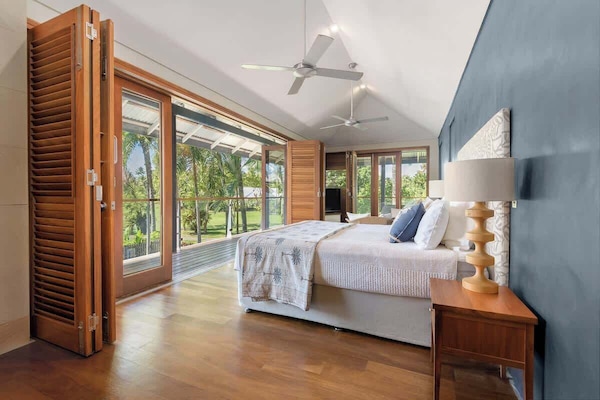 Wake up to pool and golf course views in your luxurious master suite