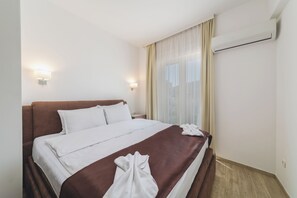 Familiesuite | 1 soverom, safe på rommet, skrivebord og wi-fi (inkludert)