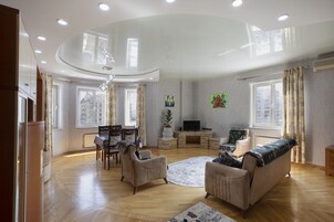 Traditional Apartment | Living area | 51-inch flat-screen TV with cable channels