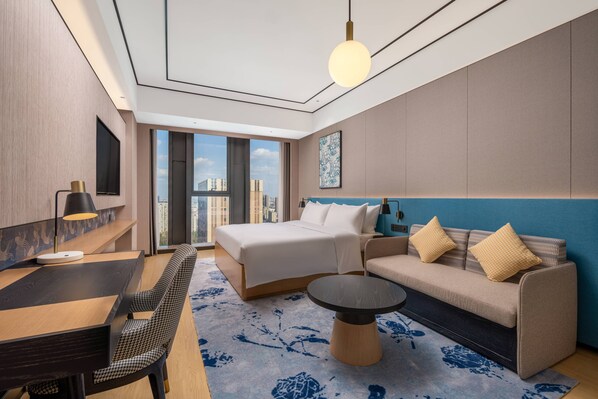 Habitación Deluxe, 1 cama King size | Ropa de cama de alta calidad, edredón y artículos del minibar gratis 