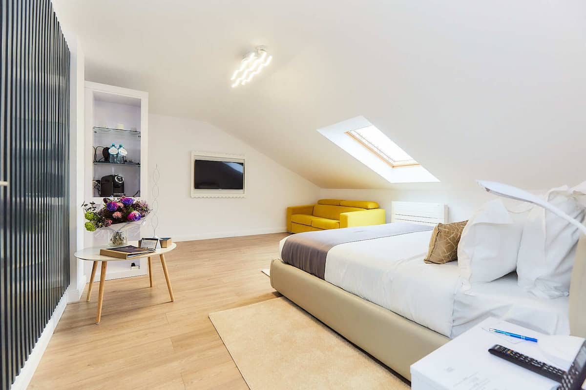 Junior Loft | Premium bedding, down comforters, memory foam beds, minibar