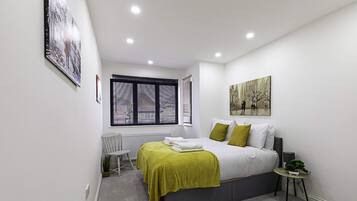 Basic Apartment, Multiple Beds | 4 bedrooms, desk, laptop workspace, iron/ironing board