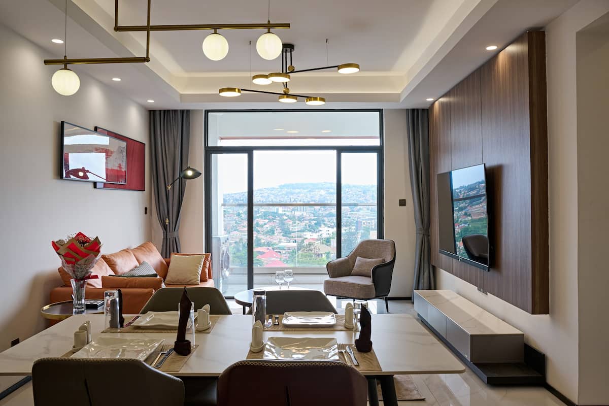 Superior Apartment | Living area | 142-cm Smart TV with digital channels
