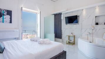 Suite Superior, idromassaggio, vista mare | Lenzuola Frette, biancheria da letto di alta qualità