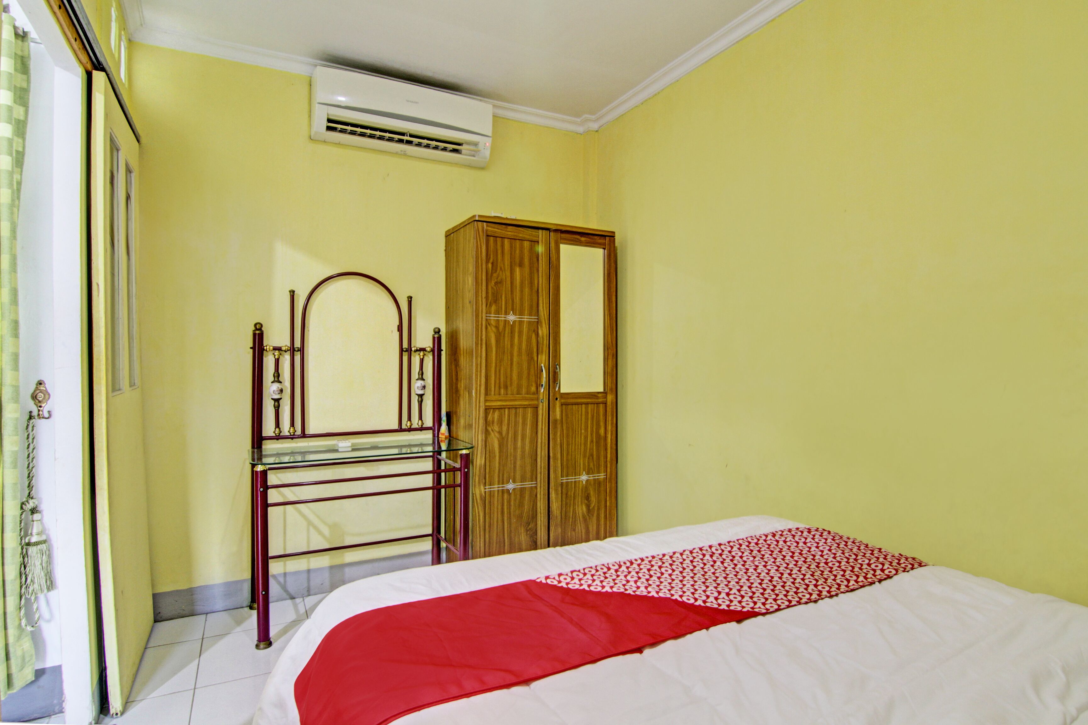 Foto - Hotel O Penginapan Budi SyariahNearTaman Amaryllis Pekanbaru