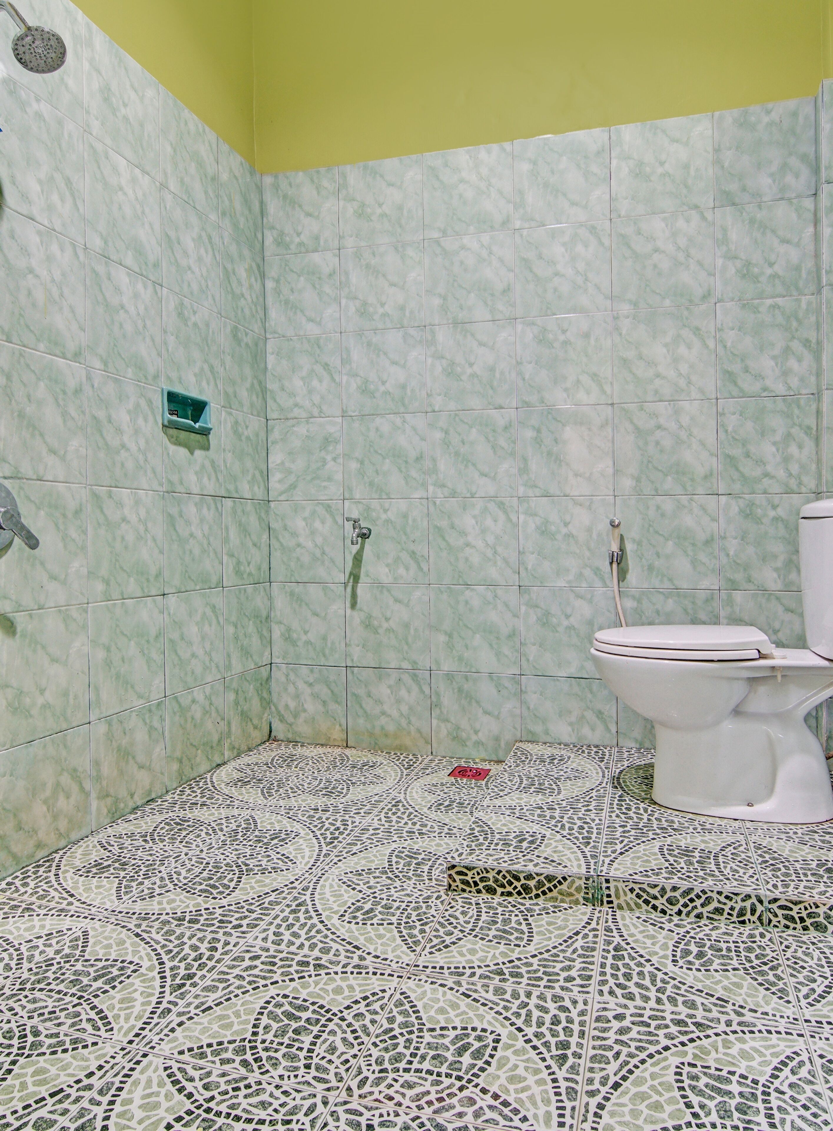 Foto - Hotel O Penginapan Budi SyariahNearTaman Amaryllis Pekanbaru