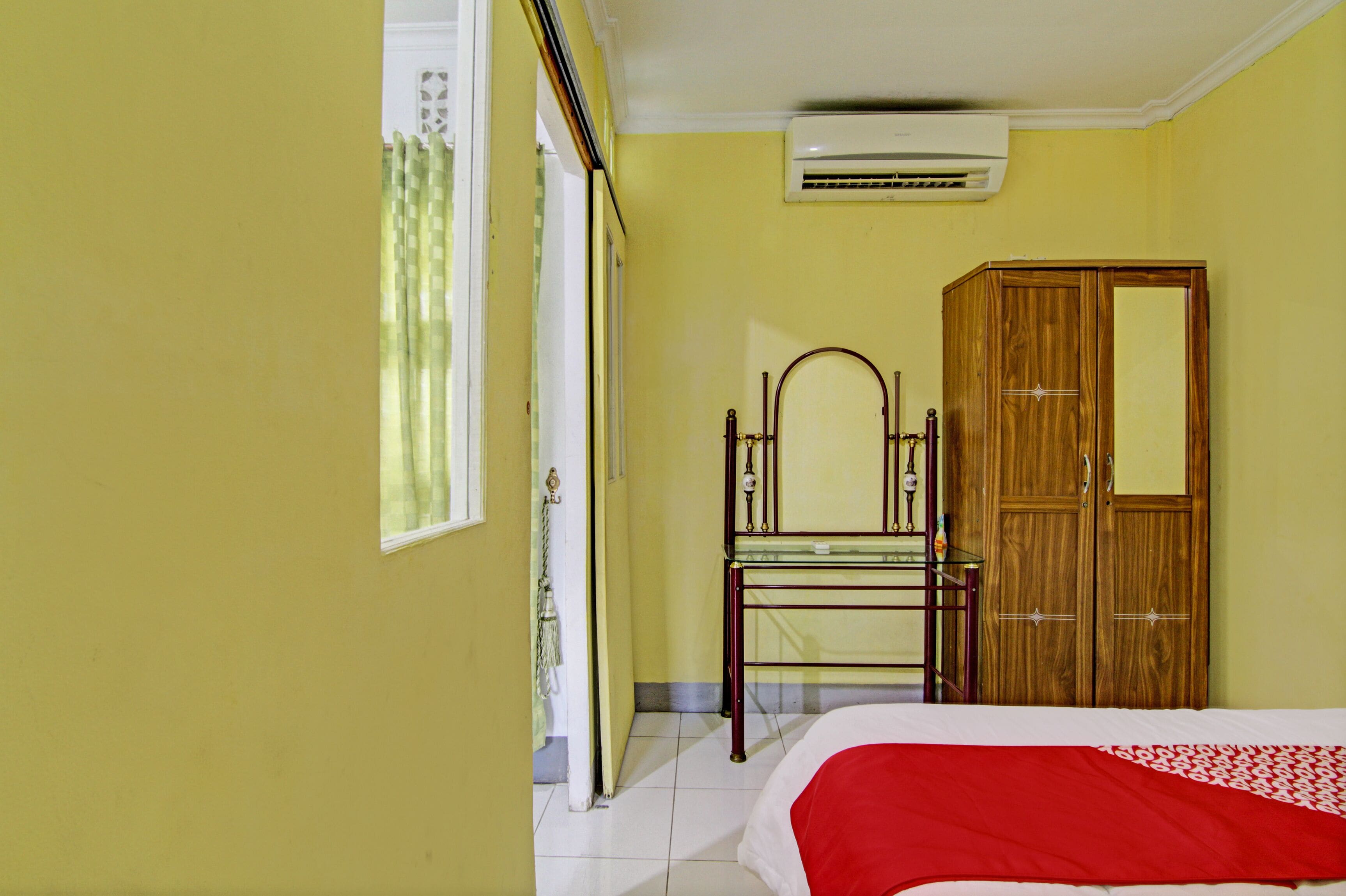 Foto - Hotel O Penginapan Budi SyariahNearTaman Amaryllis Pekanbaru