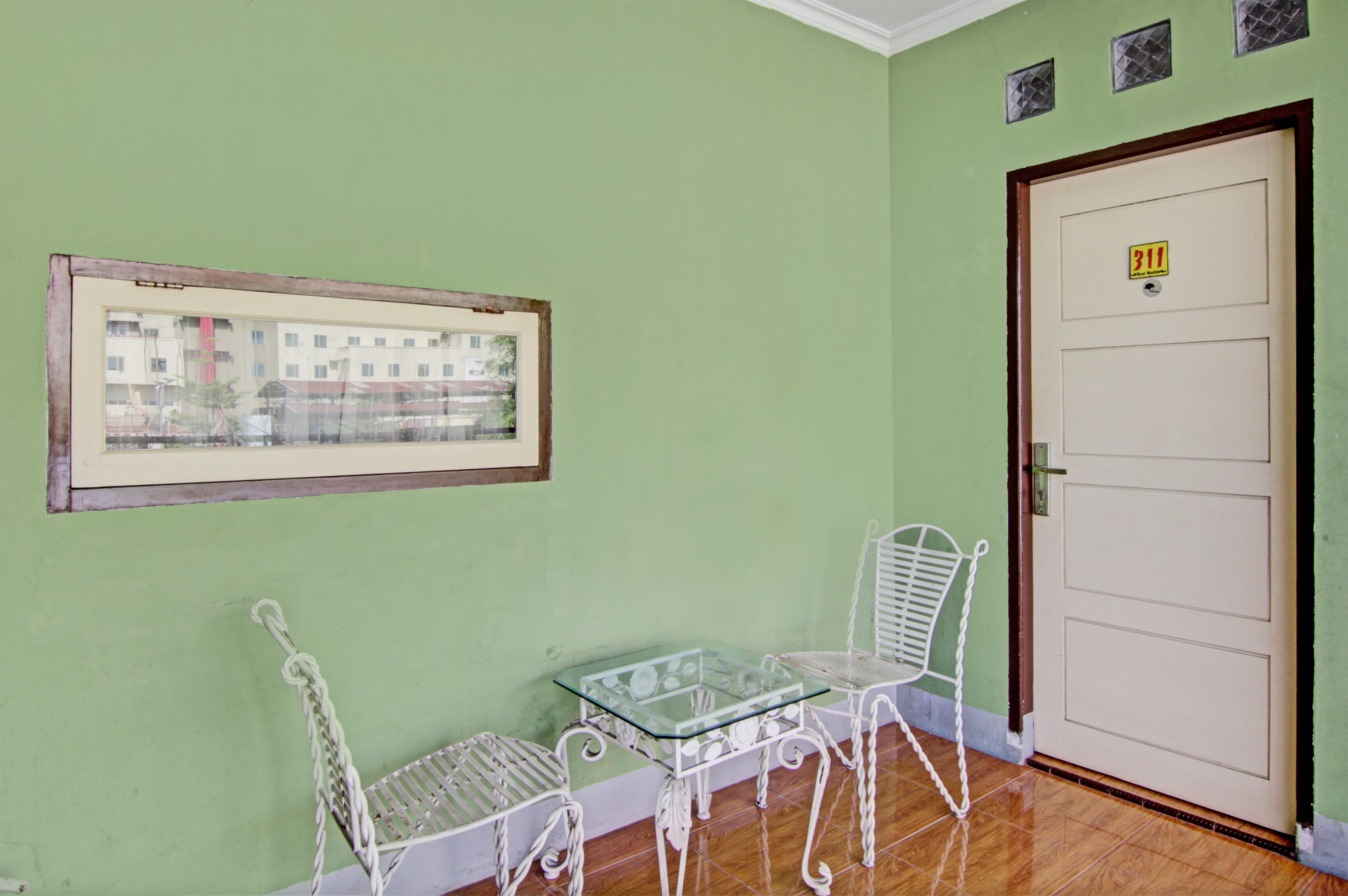 Foto - Hotel O Penginapan Budi SyariahNearTaman Amaryllis Pekanbaru