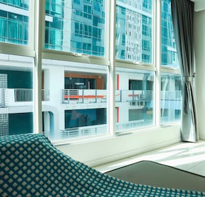 SA#04 - Chic Blue 1BR for 2-4 Pax [Tower 1] | Living area | 32-inch LED TV with cable channels - Homesuite' Home at Sutera Avenue (Kota Kinabalu)