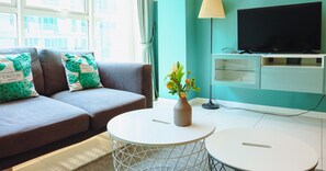 SA#03 - 2-Bedroom for 6 Pax [Tower 2] | Living area | 32-inch LED TV with cable channels - Homesuite' Home at Sutera Avenue (Kota Kinabalu)