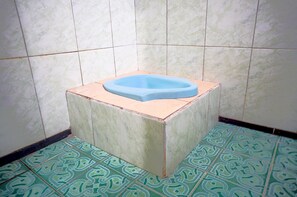 Economy Double Room | Bathroom | Shower, towels - SPOT ON 93210 Griya Kos Kanjeng Mami Syariah (Jogoroto)