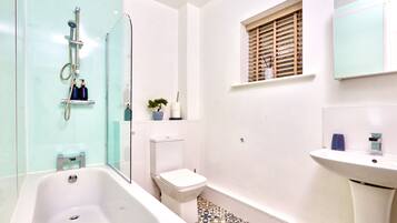 Hair dryer, towels, soap, shampoo