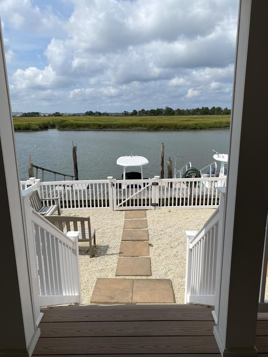 Updated bay front townhome sleeps 8.  Beautiful sunset views overlooking the bay from the 2 private docks