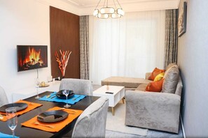 Executive-Apartment | Wohnbereich | Smart-TV