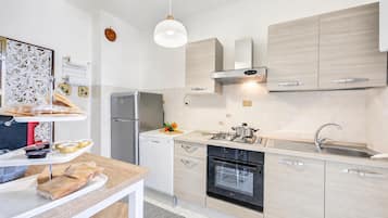Family Apartment, 3 Bedrooms, Balcony, Mountainside (La Casa di Guido: Ski, Hike, Lake) | Private kitchen | Espresso maker