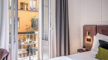 Deluxe Room, Balcony | 1 bedroom, premium bedding, down comforters, minibar