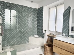 Shower, hair dryer, towels, soap