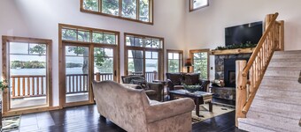 Luxury Lodge on Eagle River Chain of Lakes! With a Fireplace and dock!