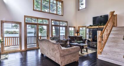 Luxury Lodge on Eagle River Chain of Lakes! With a Fireplace and dock!