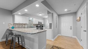 Condo, 2 Bedrooms | Private kitchen | Fridge, oven, coffee/tea maker, toaster